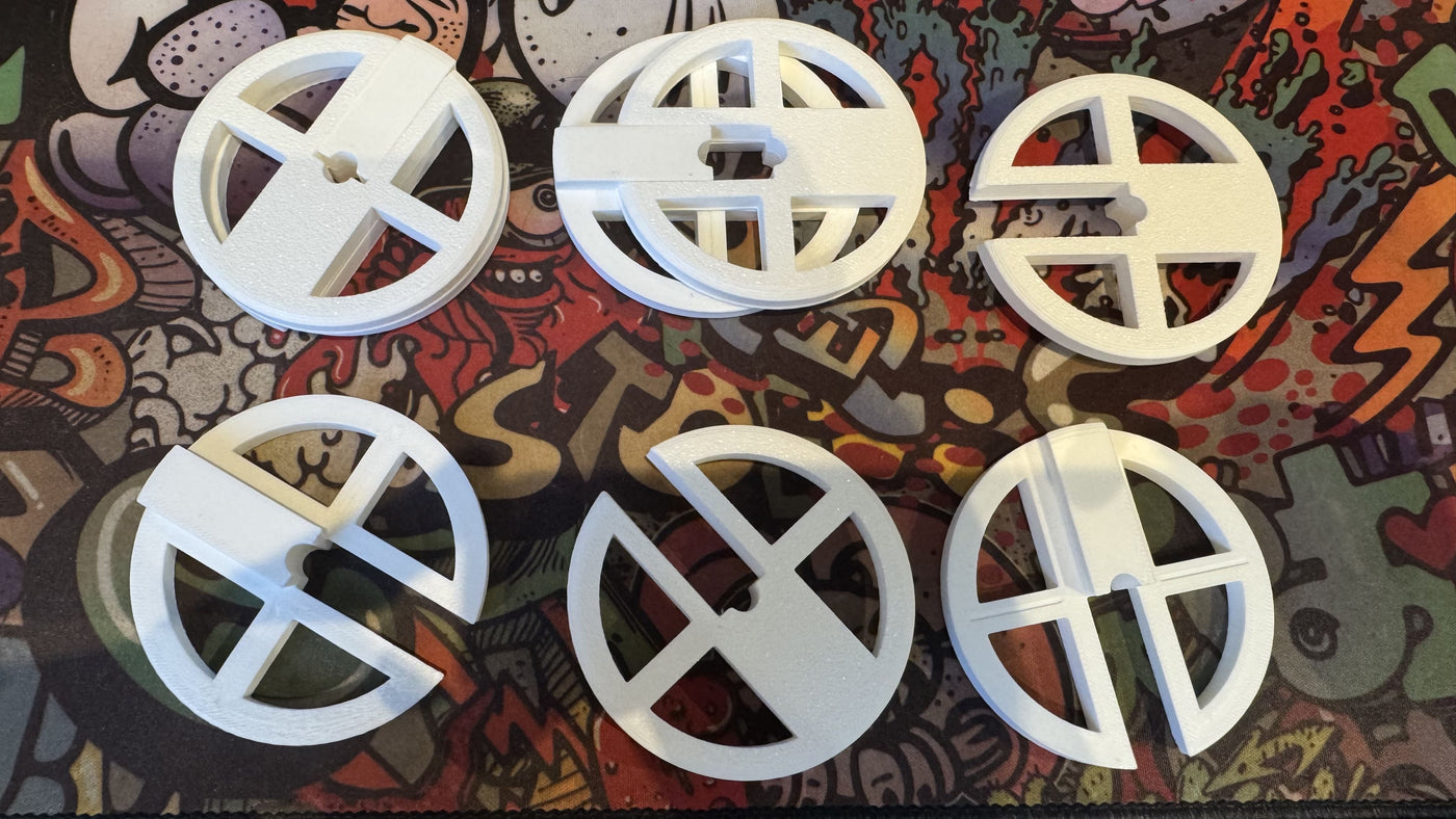 Différentes roues anti-ragage blanches imprimées en 3D